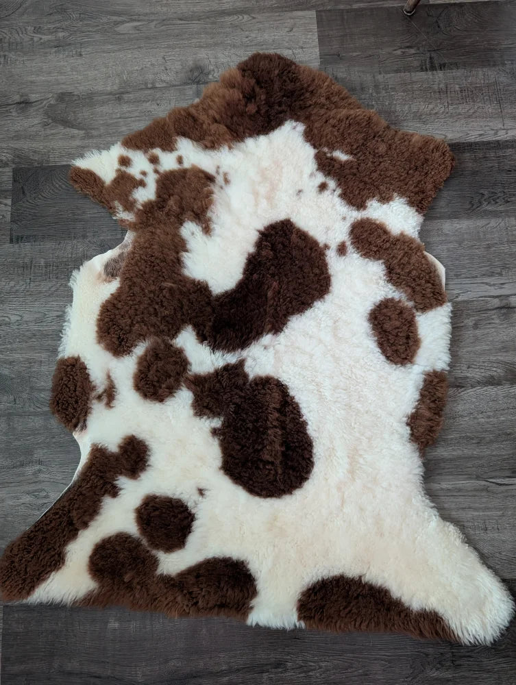 Brown and white highland spotted sheepskin rug 40 by 25 inches made from gorgeous tibet highland spotted fleece