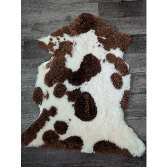 Brown and white highland spotted sheepskin rug 40 by 25 inches made from gorgeous tibet highland spotted fleece