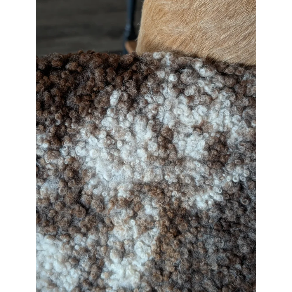 Cozy brown and white curly wool throw blanket made from grade a tibet highland spotted sheepskin, 40 by 26 inches