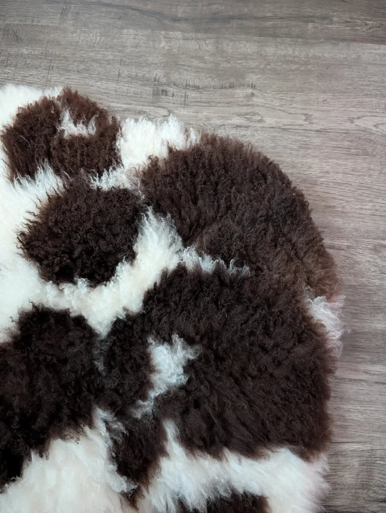 Brown and white curly tibet highland spotted sheepskin rug 39 by 25 inches grade a quality for cozy decor
