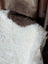 White fluffy sheepskin vest with brown fleece collar made from grade a tibet highland spotted sheepskin