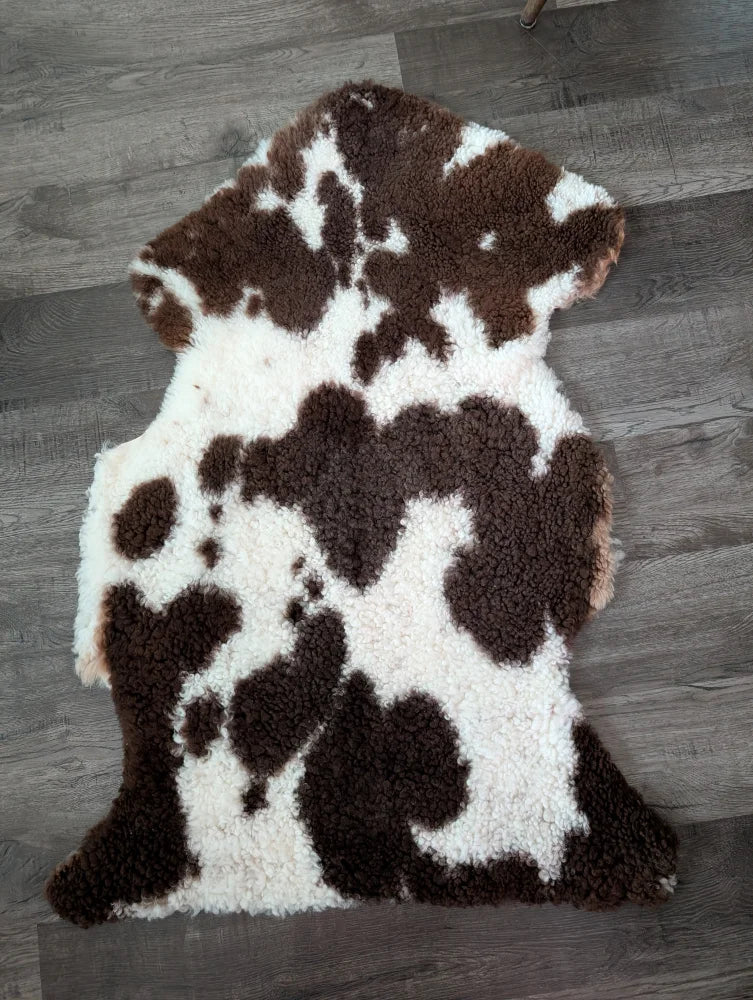 Brown and white tibet highland spotted sheepskin rug 41 x 24 inches soft and gorgeous grade a quality