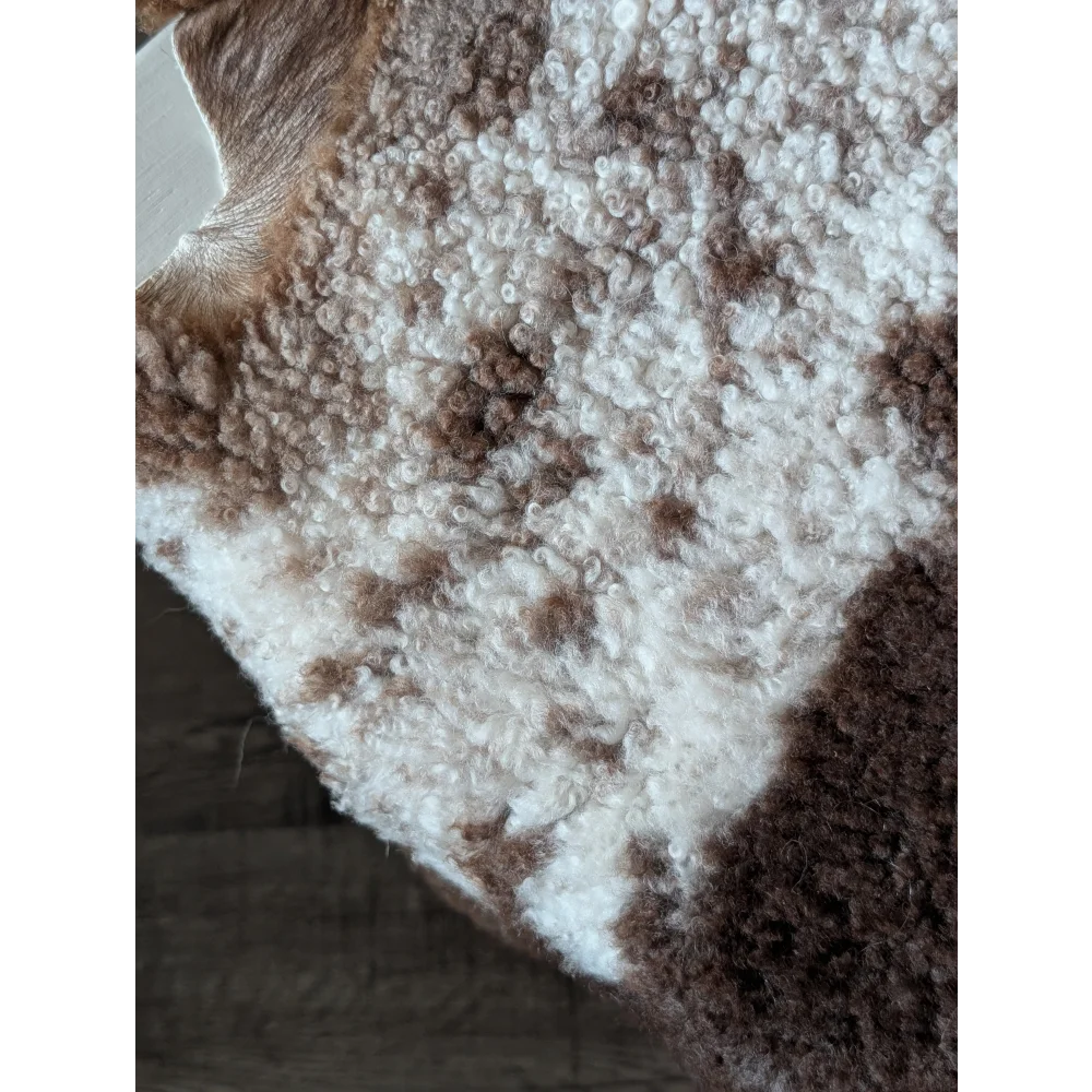 Cozy textured sweater with fluffy white and brown pattern made from grade a tibet highland spotted sheepskin