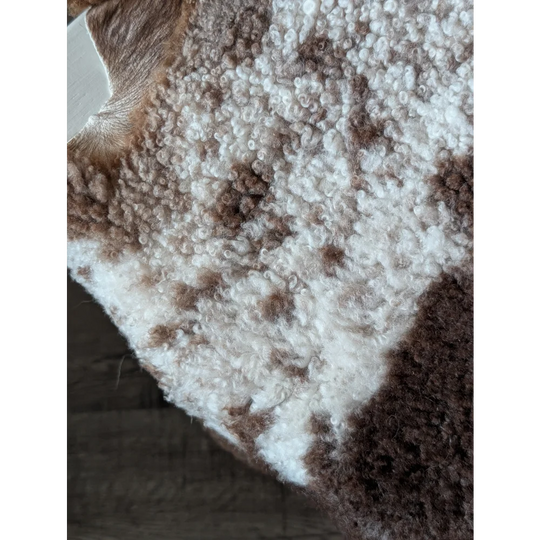Cozy textured sweater with fluffy white and brown pattern made from grade a tibet highland spotted sheepskin