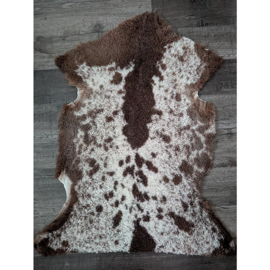 Brown and white tibet highland spotted sheepskin rug with natural fluffy texture 40.5 x 24.5 inches grade a