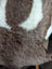 A gorgeous tibet highland spotted sheepskin rug in soft brown and creamy white plush grade a quality