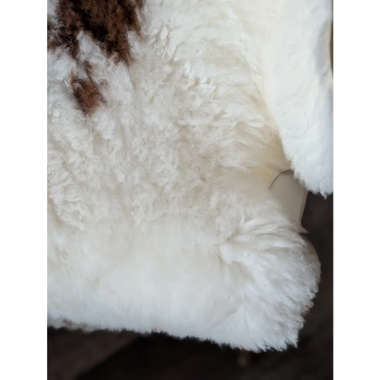 White fluffy tibet highland spotted sheepskin rug with brown patch 41 by 26.5 inches grade a quality