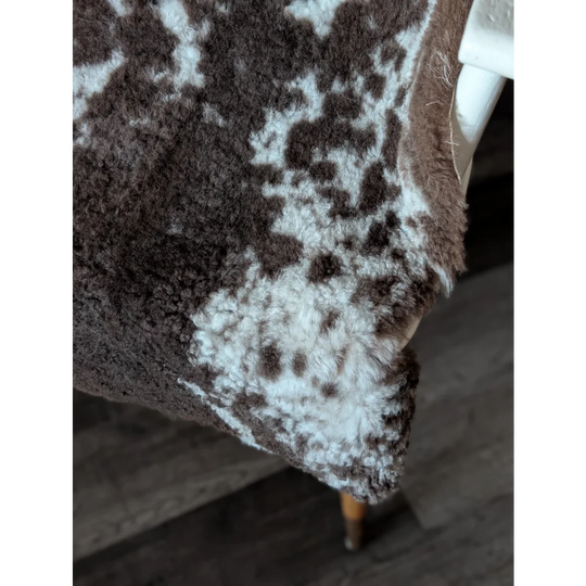 Brown and white spotted tibet highland spotted sheepskin blanket with soft fluffy texture 40 by 25 inches grade a