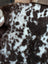 Brown and white speckled shearling vest made from tibet highland spotted grade a sheepskin for cozy warmth