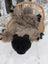 Furry gray and black hand made merino sheepskin grizzly bear rug with soft textured fur and black paw pads