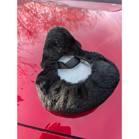 Cozy black gray fur neck warmer with white lining on merino sheepskin bicycle seat