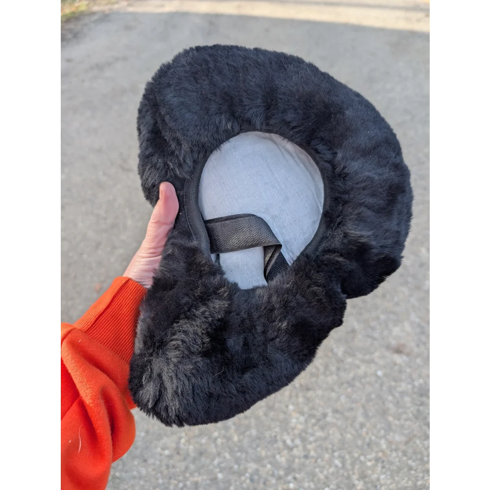 Cozy merino sheepskin bicycle seat with gray plush neck pillow