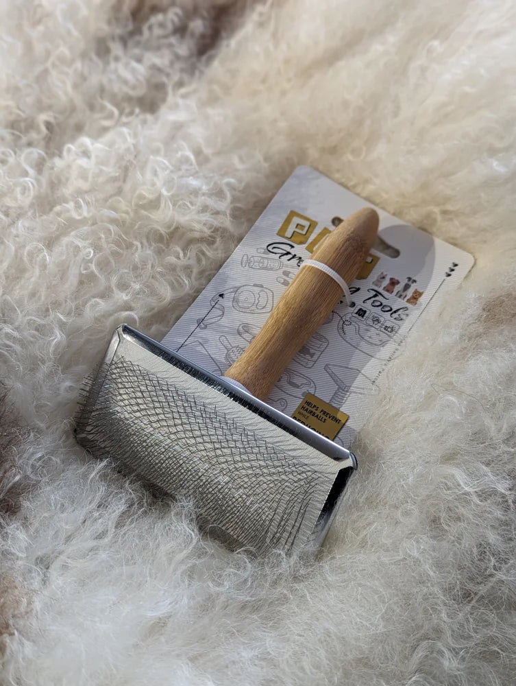Silver sheepskin brush with wooden handle and metal grid