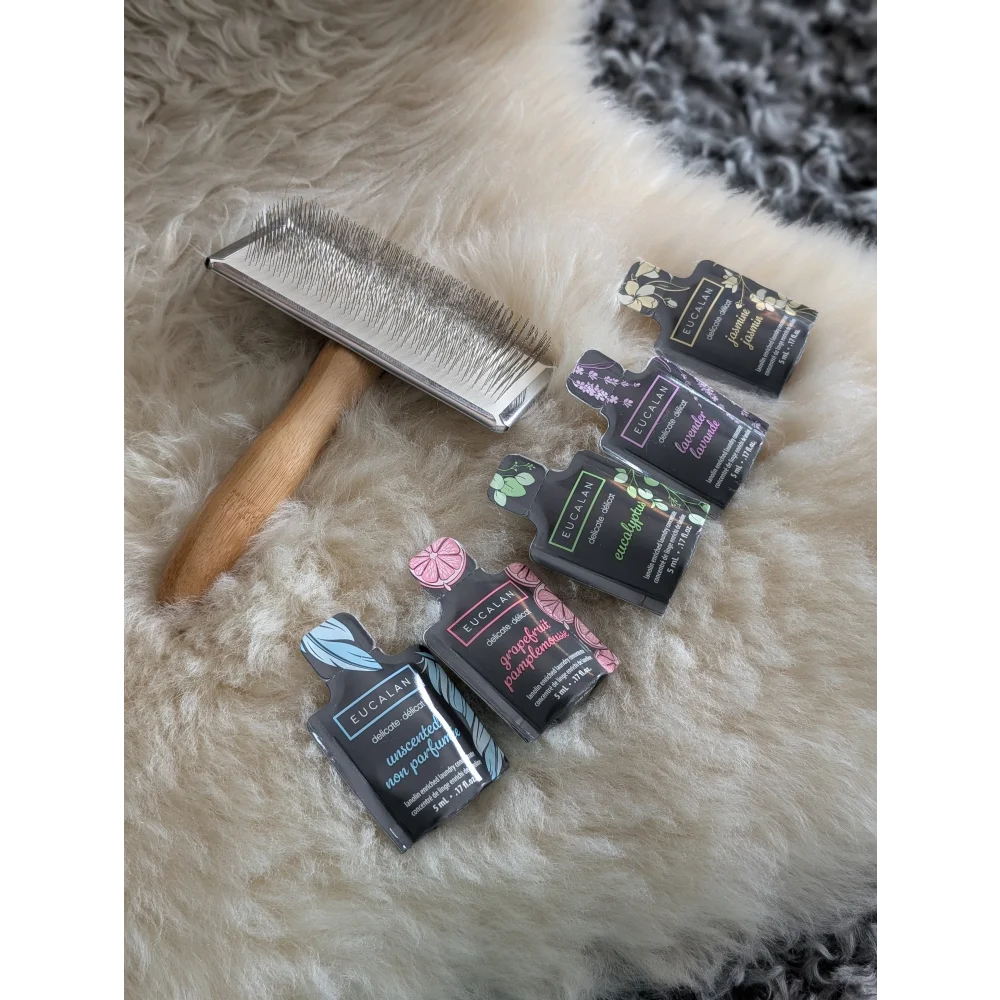 Wooden-handled grooming brush in Sheepskin Care Pack with silver bristles