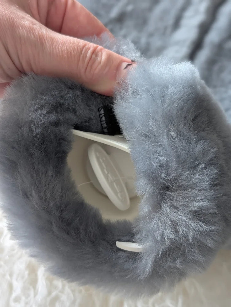 Gray faux fur sheepskin hot water bottle cover with white lid for chilly nights