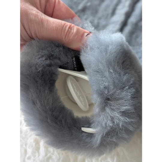 Gray faux fur sheepskin hot water bottle cover with white lid for chilly nights