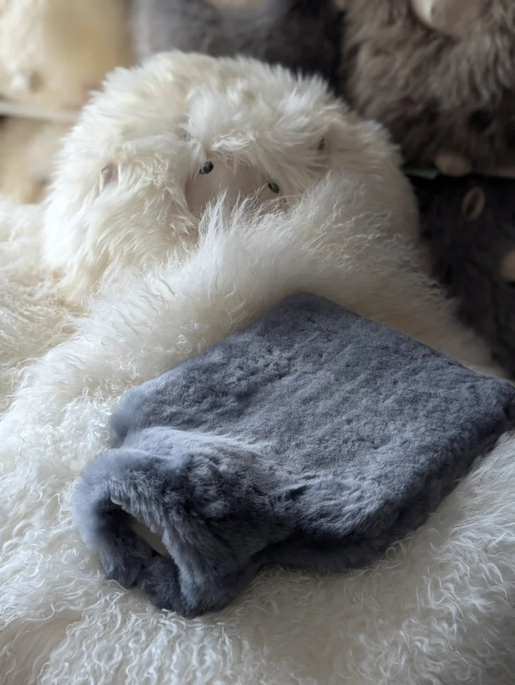 Soft plush gray sheepskin hot water bottle cover for chilly nights
