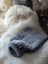 Soft plush gray sheepskin hot water bottle cover for chilly nights