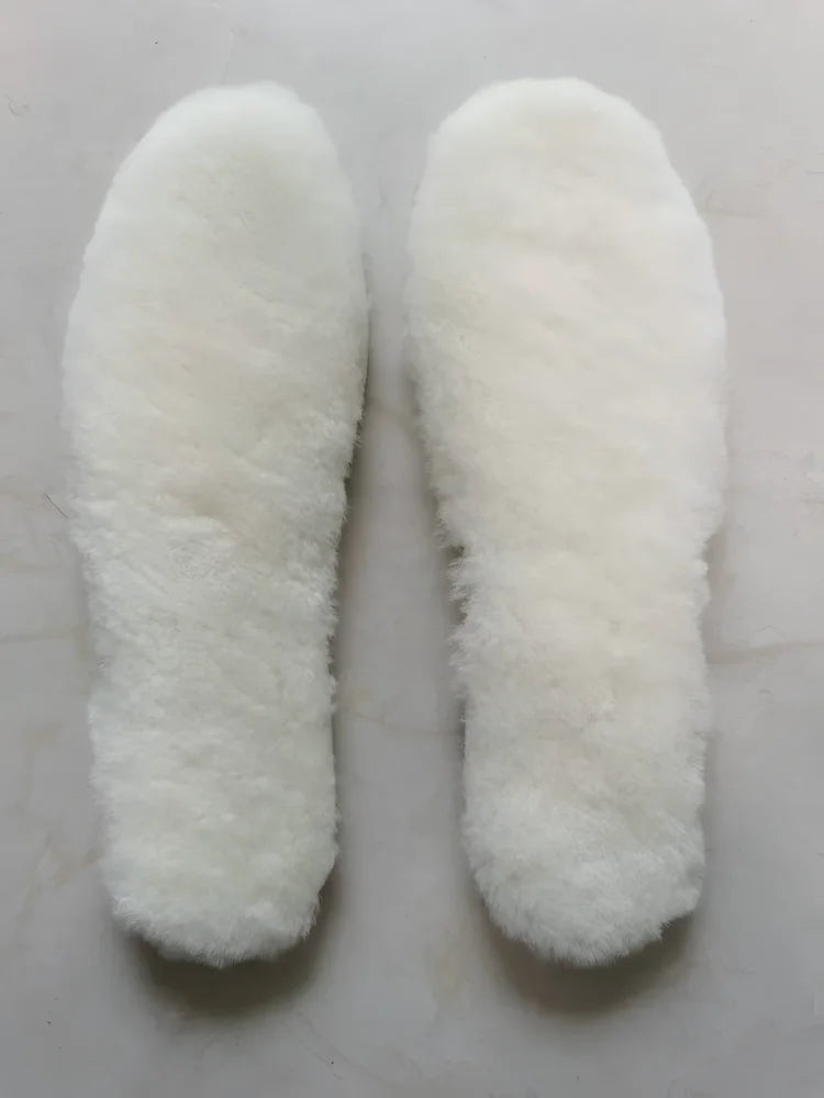 White fluffy sheepskin insoles made from Merino sheepskin for comfy sheepskin shoes