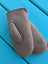 A pair of taupe sheepskin mittens with soft textured surface and neat stitching perfect for winter mittens and sheepskin gloves