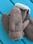 Tan sheepskin mittens with plush white fleece lining perfect for cozy winter mittens or sheepskin gloves use