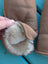 Tan sheepskin mittens with plush white fleece lining perfect for cozy winter mittens and sheepskin gloves use
