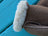 Brown sheepskin mittens with plush white fur lining perfect as warm winter mittens or sheepskin gloves