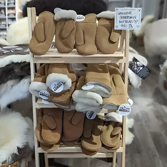 Cozy tan and brown UGG sheepskin mittens for winter