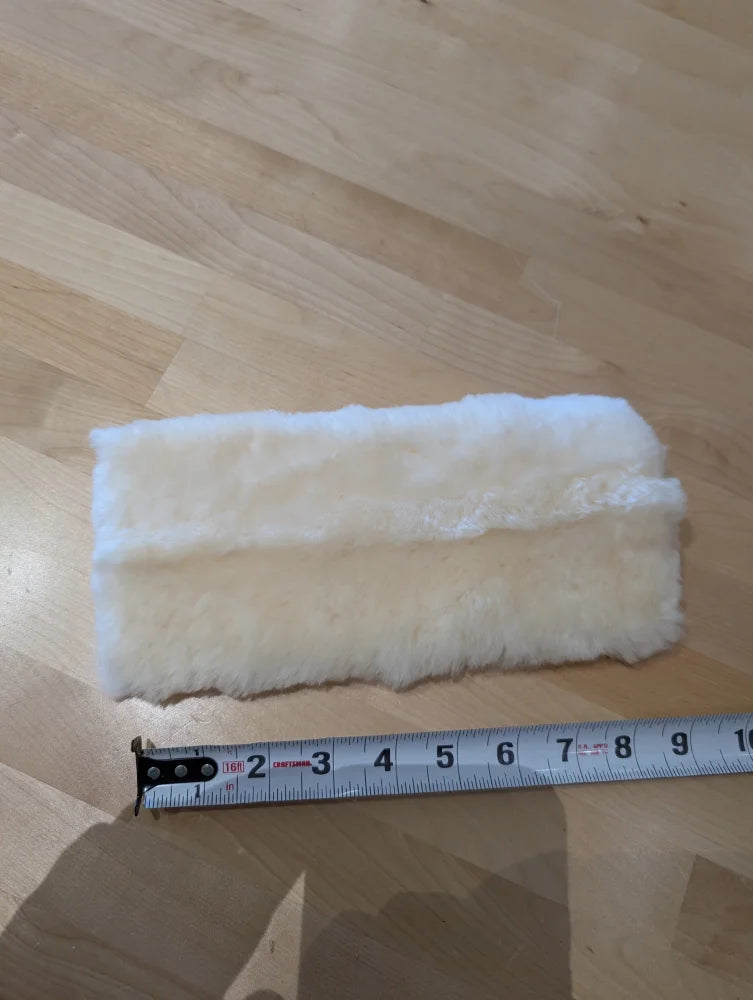 Soft white fluffy sheepskin noseband cover pillow with plush texture