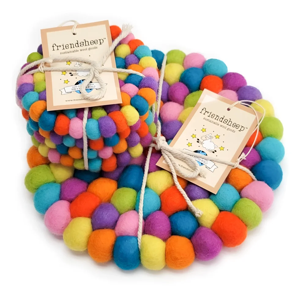 Vibrant rainbow eco coasters made from soft wool felt tied with natural twine measuring perfect for eco trivet use