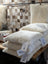 Cozy cream sheepskin pet bed stuffed with Canadian sheep’s wool