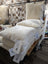 Cozy cream merino sheepskin pet bed stuffed with Canadian sheep’s wool