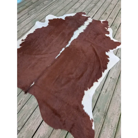 Large 85x74.5 cowhide rug with brown white patches and leather texture