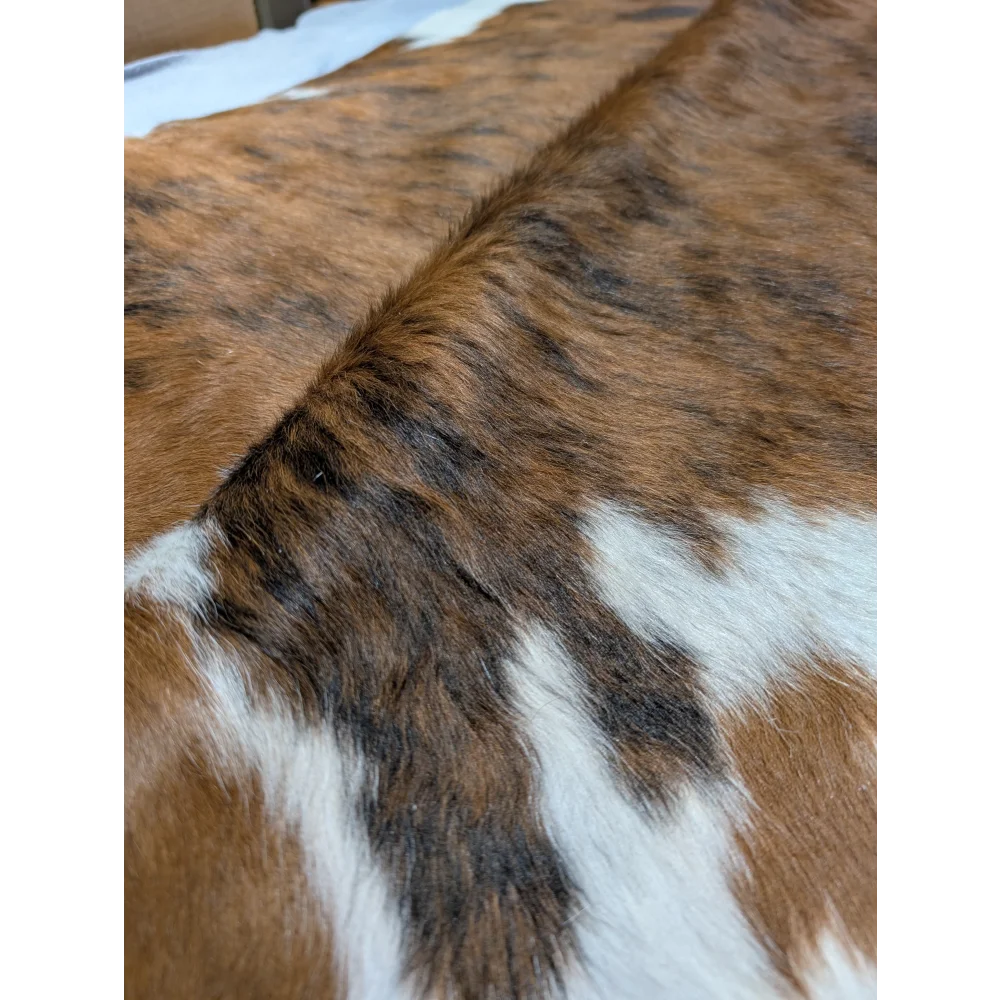 Large cowhide rug, brown and white, 86x77 inches, soft underfoot
