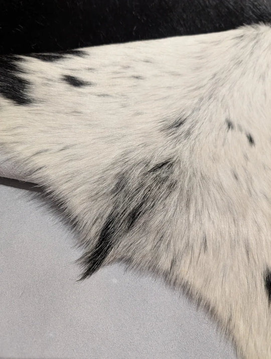 Soft underfoot black and white spotted cowhide rug, 85x75 inches