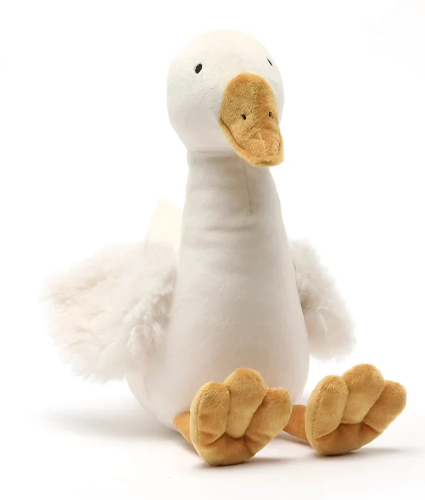 A soft white plush goose named snowy with a tan beak and feet and fluffy wings perfect for cuddling