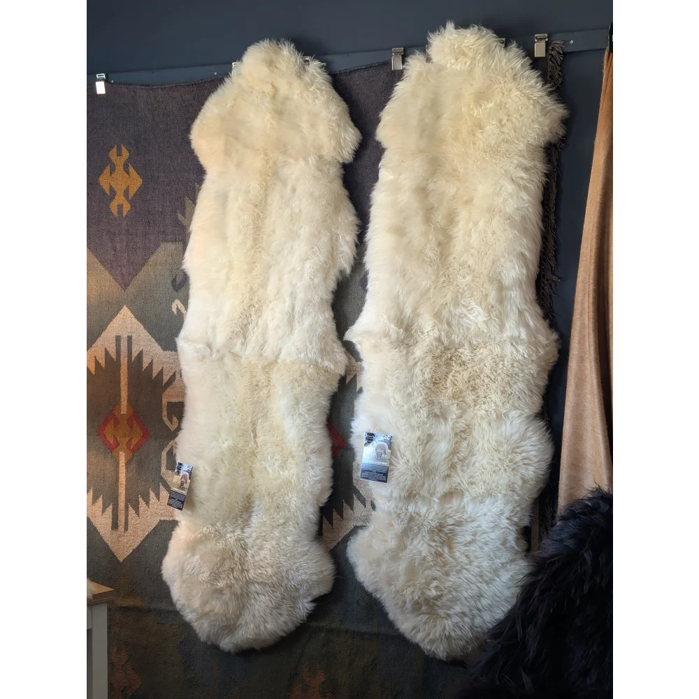 Cream-colored double merino sheepskin rug with soft, textured pile