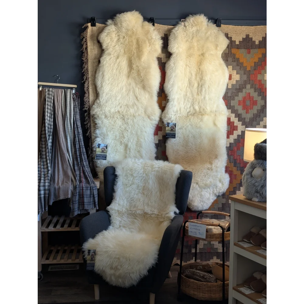 Soft fluffy cream double merino sheepskin rug from Angus Oliver Luxury