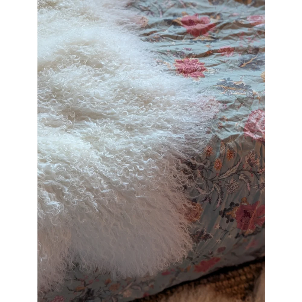 Gorgeous cream fluffy Mongolian sheepskin throw with floral pattern