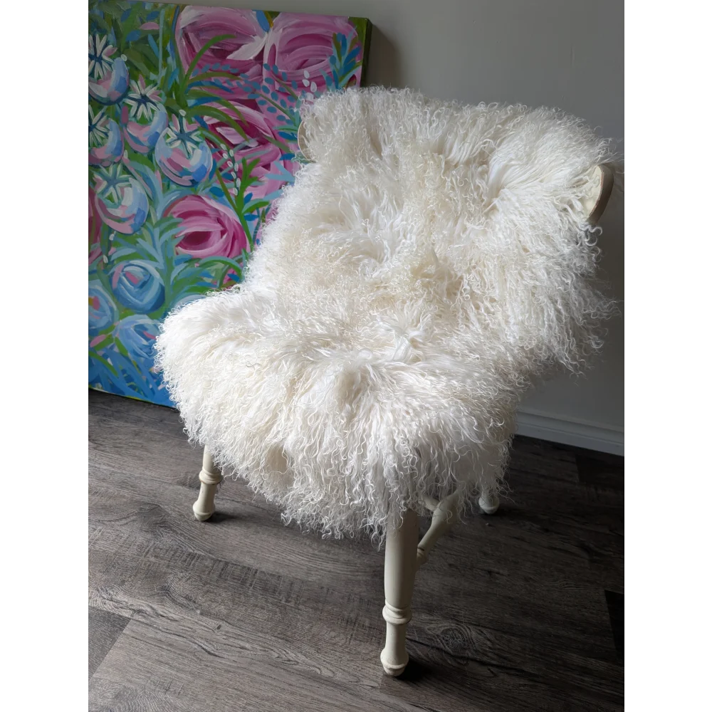 Gorgeous white Mongolian sheepskin armchair with wooden legs and floral art