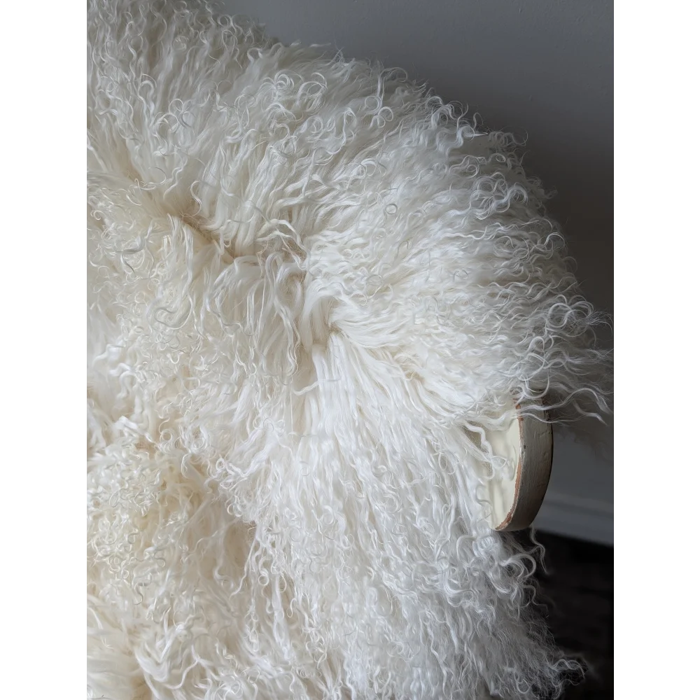 Gorgeous Angus Oliver Mongolian sheepskin pillow with fluffy white curly fur