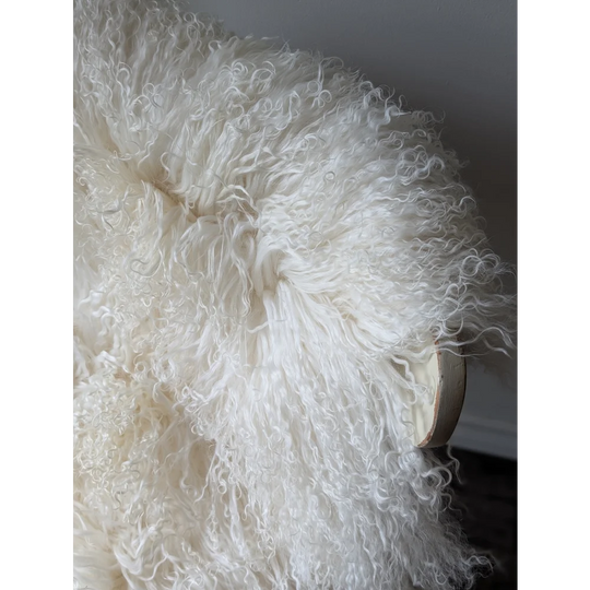 Gorgeous Angus Oliver Mongolian sheepskin pillow with fluffy white curly fur