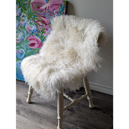 Gorgeous Angus Oliver Mongolian sheepskin on white fur armchair