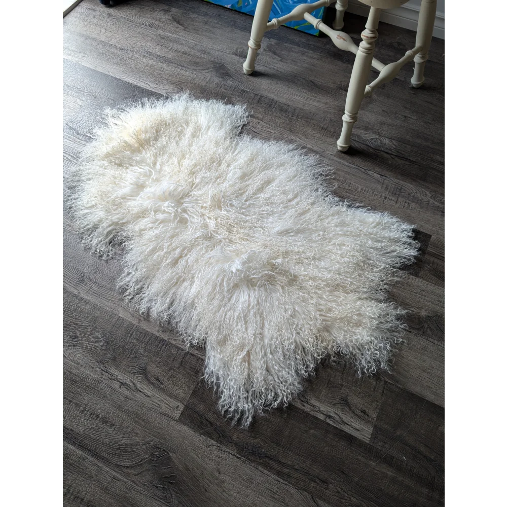 Gorgeous Mongolian sheepskin rug with white fluffy texture