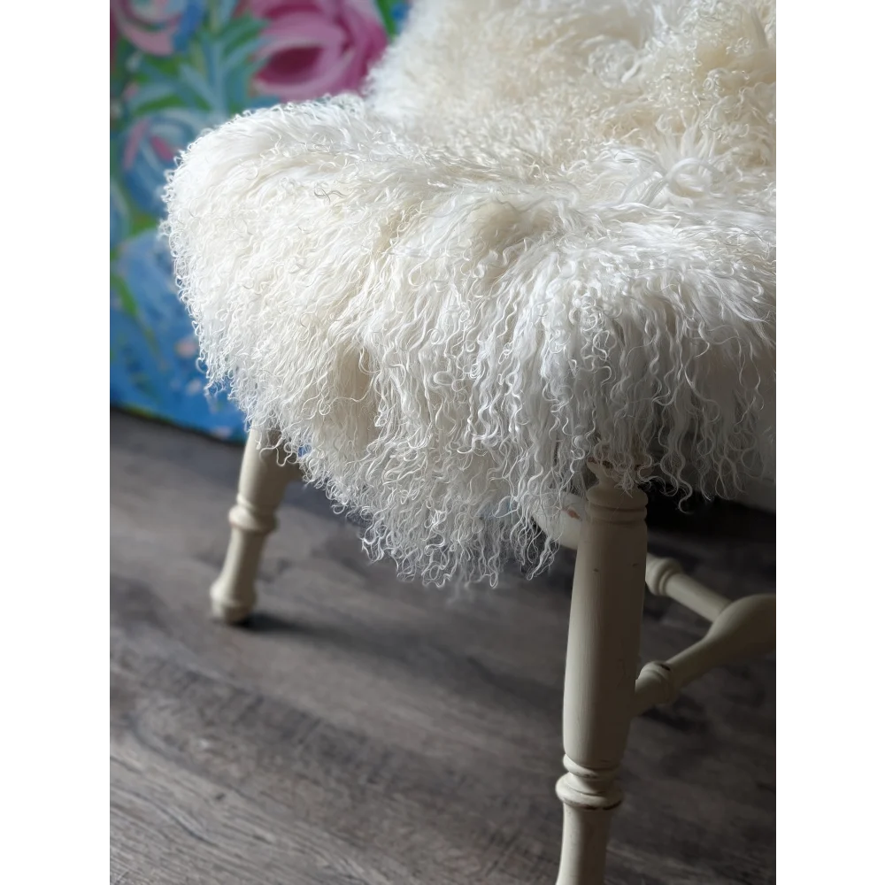 Gorgeous Angus Oliver Mongolian sheepskin throw pillow with wooden legs