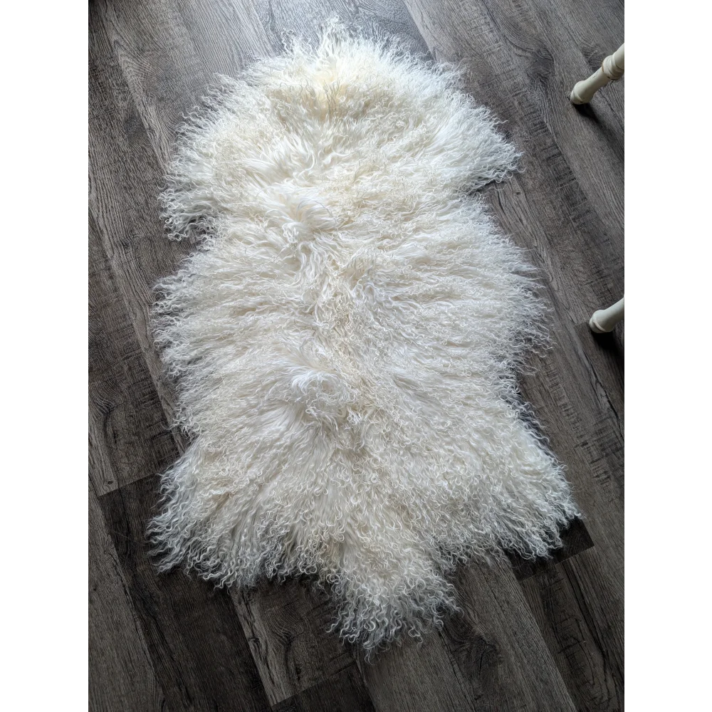 Gorgeous Angus Oliver Mongolian sheepskin rug with soft white fur