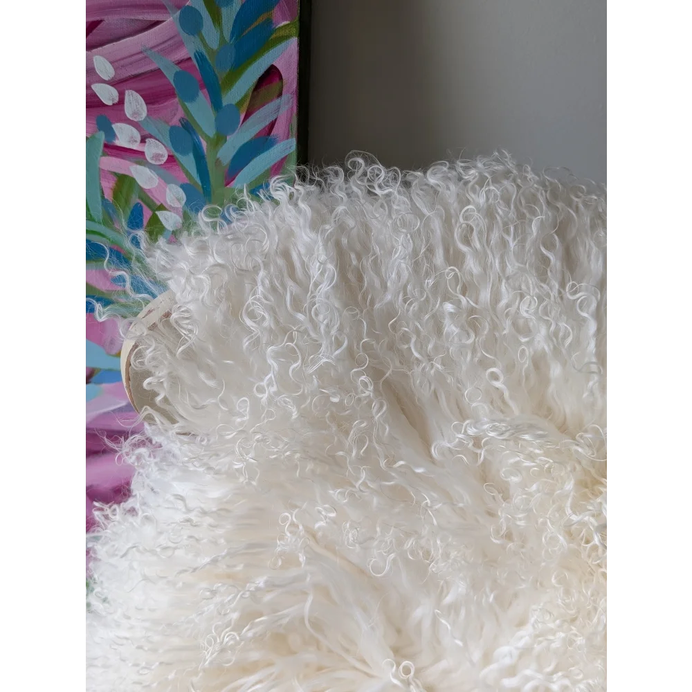 White fluffy Angus Oliver Mongolian sheepskin throw blanket