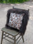 Faux fur throw pillow with white brown and black spotted pattern inspired by natural cowhide and long wool textures