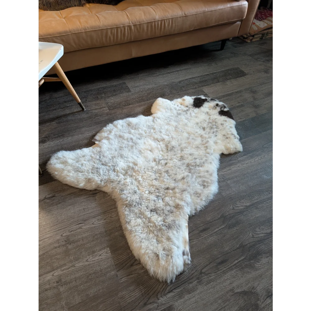 White and black speckled icelandic sheepskin rug with fluffy short wool natural texture 49.5 x 31 inches