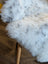 White and gray speckled icelandic sheepskin throw blanket with soft short wool texture 45 by 31 inches large spot38